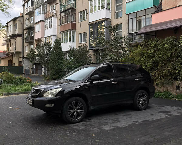 Черный Лексус РХ, объемом двигателя 3.5 л и пробегом 214 тыс. км за 12800 $, фото 1 на Automoto.ua
