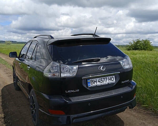 Черный Лексус РХ, объемом двигателя 3.46 л и пробегом 170 тыс. км за 15000 $, фото 1 на Automoto.ua