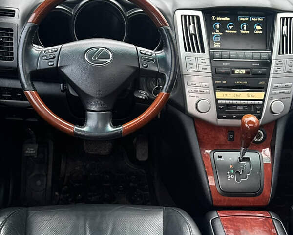 Черный Лексус РХ, объемом двигателя 3.46 л и пробегом 195 тыс. км за 11950 $, фото 159 на Automoto.ua