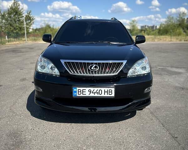 Черный Лексус РХ, объемом двигателя 3.46 л и пробегом 165 тыс. км за 13400 $, фото 2 на Automoto.ua