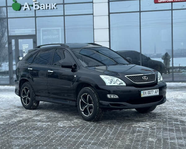 Черный Лексус РХ, объемом двигателя 3.46 л и пробегом 195 тыс. км за 11950 $, фото 92 на Automoto.ua