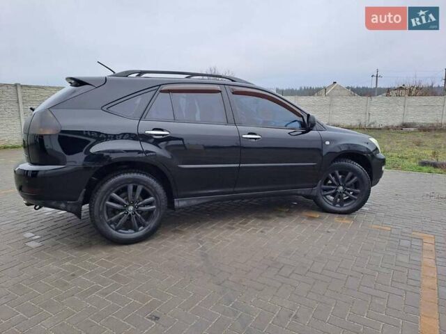 Черный Лексус РХ, объемом двигателя 3.46 л и пробегом 270 тыс. км за 9700 $, фото 2 на Automoto.ua