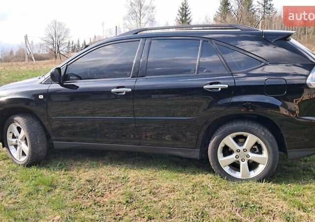 Черный Лексус РХ, объемом двигателя 3.46 л и пробегом 145 тыс. км за 17700 $, фото 96 на Automoto.ua