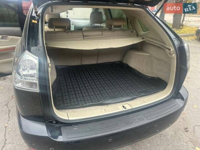 Черный Лексус РХ, объемом двигателя 3.46 л и пробегом 220 тыс. км за 12800 $, фото 1 на Automoto.ua