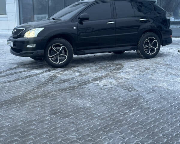 Черный Лексус РХ, объемом двигателя 3.46 л и пробегом 195 тыс. км за 11950 $, фото 57 на Automoto.ua