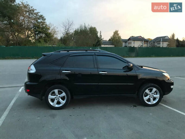 Черный Лексус РХ, объемом двигателя 3.46 л и пробегом 217 тыс. км за 15500 $, фото 1 на Automoto.ua