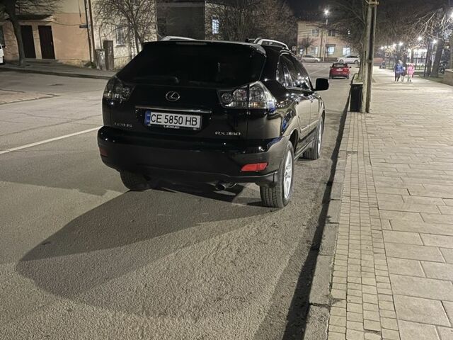 Черный Лексус РХ, объемом двигателя 3.5 л и пробегом 265 тыс. км за 10500 $, фото 1 на Automoto.ua