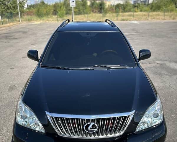 Черный Лексус РХ, объемом двигателя 3.46 л и пробегом 165 тыс. км за 13400 $, фото 3 на Automoto.ua