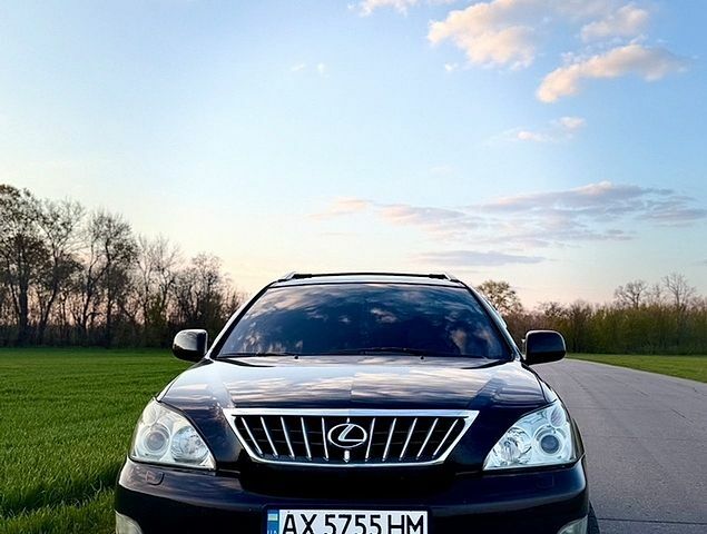 Чорний Лексус РХ, об'ємом двигуна 3.5 л та пробігом 243 тис. км за 11400 $, фото 7 на Automoto.ua
