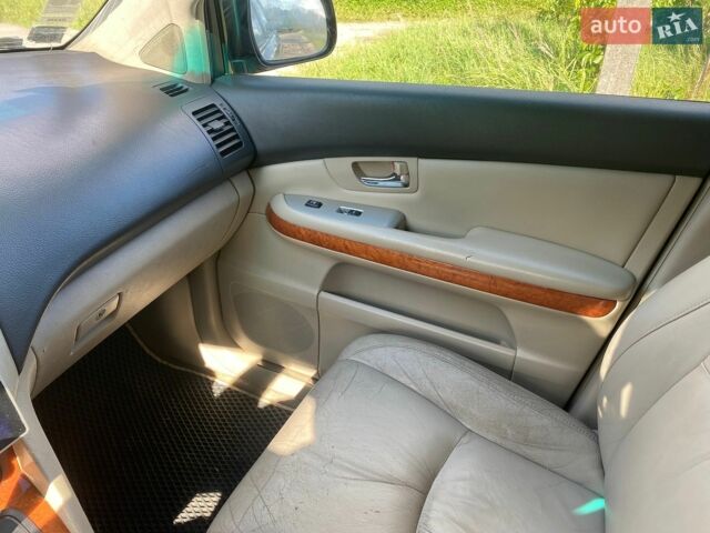 Черный Лексус РХ, объемом двигателя 3.31 л и пробегом 285 тыс. км за 10900 $, фото 6 на Automoto.ua