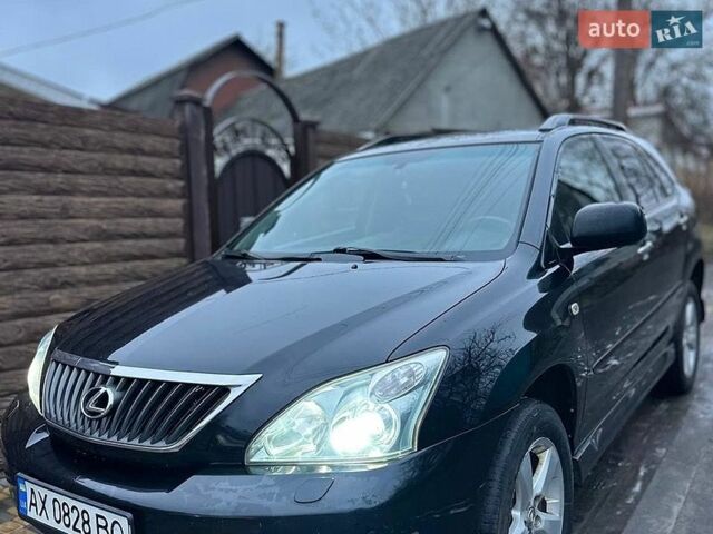 Черный Лексус РХ, объемом двигателя 3.46 л и пробегом 296 тыс. км за 9500 $, фото 1 на Automoto.ua