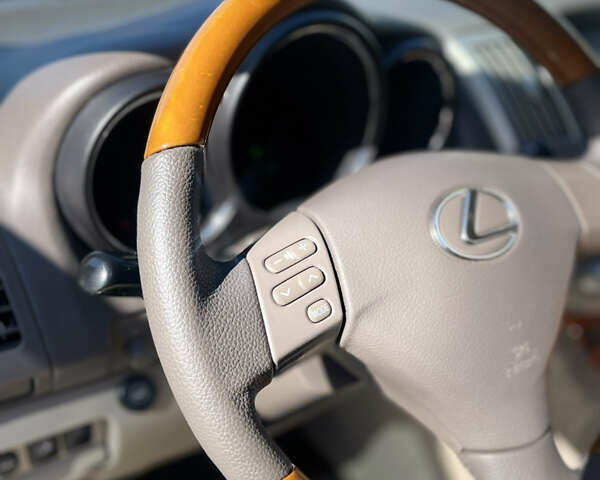 Черный Лексус РХ, объемом двигателя 3.46 л и пробегом 277 тыс. км за 9999 $, фото 2 на Automoto.ua