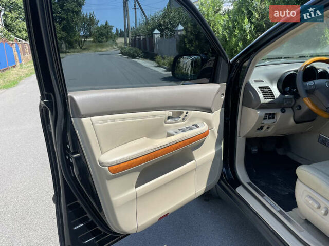 Черный Лексус РХ, объемом двигателя 3.46 л и пробегом 277 тыс. км за 9999 $, фото 4 на Automoto.ua