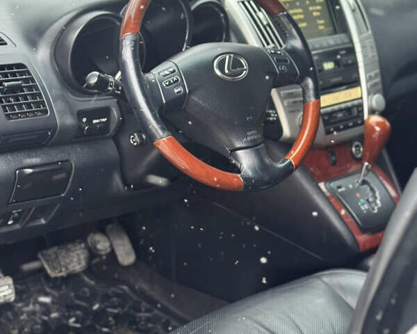 Черный Лексус РХ, объемом двигателя 3.46 л и пробегом 195 тыс. км за 11950 $, фото 147 на Automoto.ua