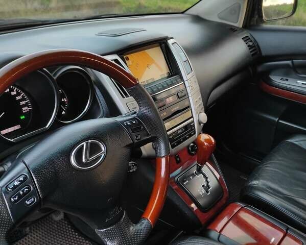 Черный Лексус РХ, объемом двигателя 3.5 л и пробегом 242 тыс. км за 10000 $, фото 17 на Automoto.ua