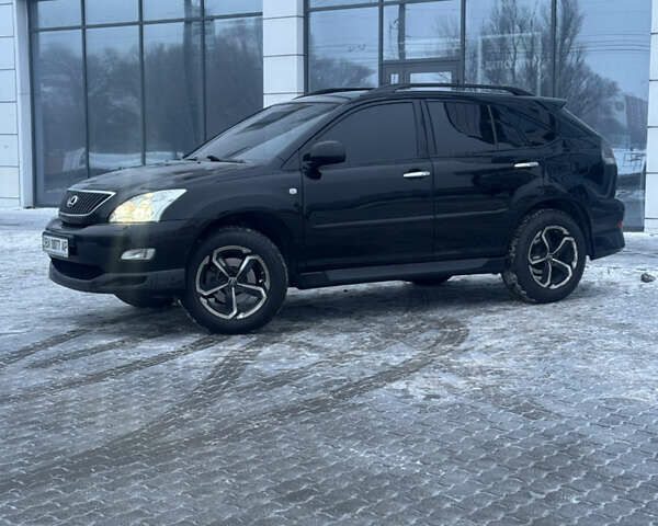 Черный Лексус РХ, объемом двигателя 3.46 л и пробегом 195 тыс. км за 11950 $, фото 62 на Automoto.ua