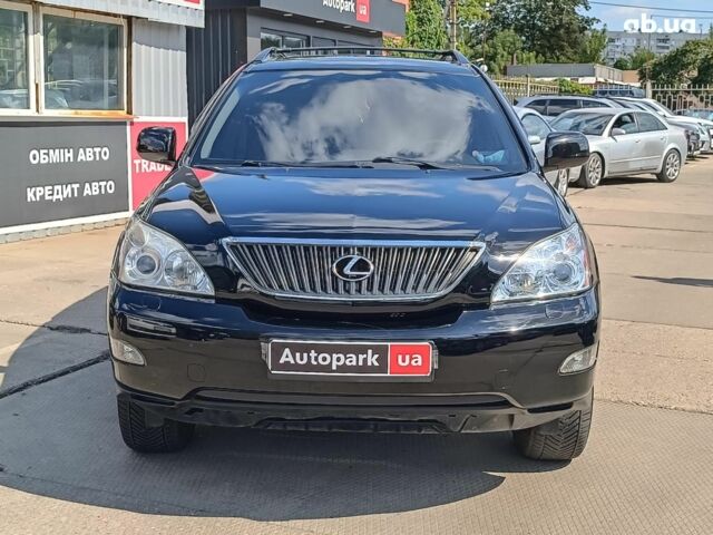 Черный Лексус РХ, объемом двигателя 3.5 л и пробегом 187 тыс. км за 11390 $, фото 1 на Automoto.ua