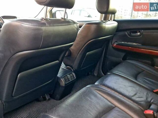 Черный Лексус РХ, объемом двигателя 3.46 л и пробегом 256 тыс. км за 11350 $, фото 42 на Automoto.ua