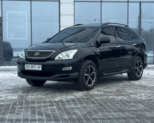 Черный Лексус РХ, объемом двигателя 3.46 л и пробегом 195 тыс. км за 11950 $, фото 3 на Automoto.ua
