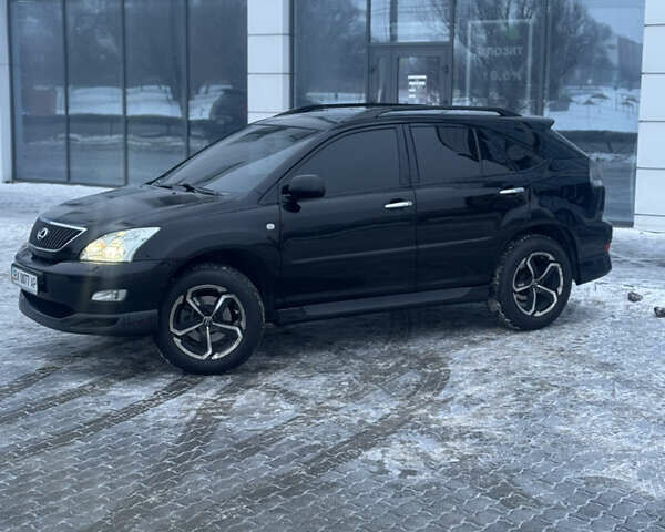 Черный Лексус РХ, объемом двигателя 3.46 л и пробегом 195 тыс. км за 11950 $, фото 66 на Automoto.ua
