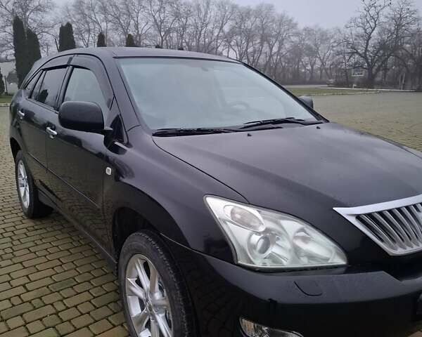 Черный Лексус РХ, объемом двигателя 3.46 л и пробегом 260 тыс. км за 11000 $, фото 2 на Automoto.ua