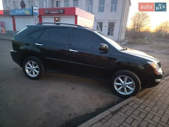 Черный Лексус РХ, объемом двигателя 3.46 л и пробегом 165 тыс. км за 13500 $, фото 1 на Automoto.ua