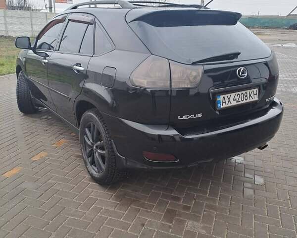 Черный Лексус РХ, объемом двигателя 3.46 л и пробегом 270 тыс. км за 9700 $, фото 3 на Automoto.ua