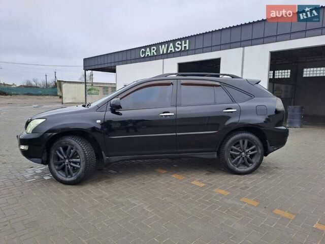 Черный Лексус РХ, объемом двигателя 3.46 л и пробегом 270 тыс. км за 9700 $, фото 1 на Automoto.ua