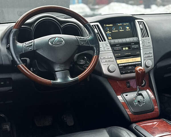 Черный Лексус РХ, объемом двигателя 3.46 л и пробегом 195 тыс. км за 11950 $, фото 140 на Automoto.ua