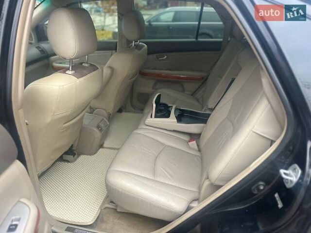 Черный Лексус РХ, объемом двигателя 3.46 л и пробегом 220 тыс. км за 12800 $, фото 3 на Automoto.ua