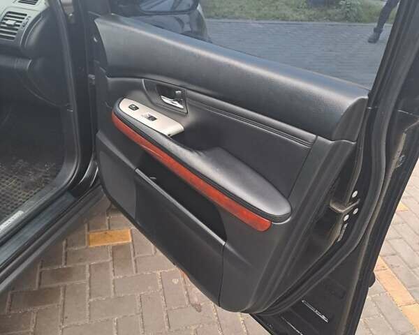 Черный Лексус РХ, объемом двигателя 3.46 л и пробегом 270 тыс. км за 9700 $, фото 6 на Automoto.ua