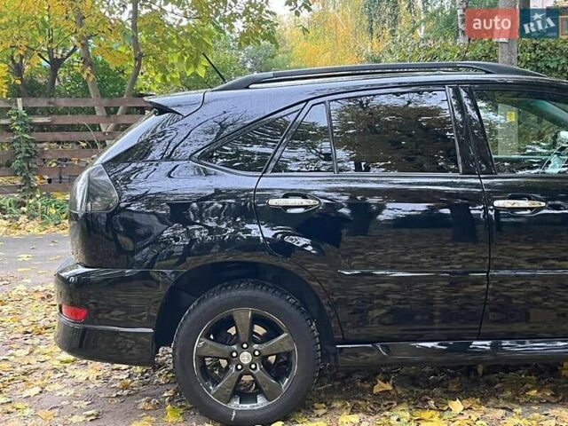 Черный Лексус РХ, объемом двигателя 3.5 л и пробегом 295 тыс. км за 10790 $, фото 6 на Automoto.ua