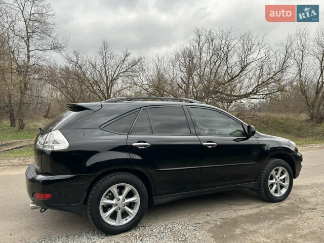 Черный Лексус РХ, объемом двигателя 3.46 л и пробегом 106 тыс. км за 12300 $, фото 3 на Automoto.ua