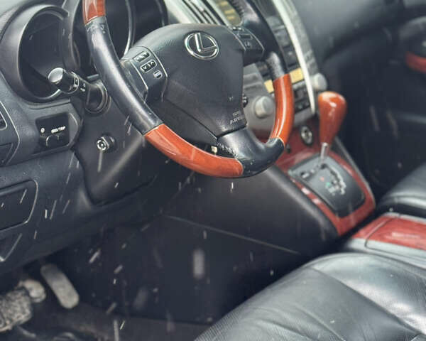 Черный Лексус РХ, объемом двигателя 3.46 л и пробегом 195 тыс. км за 11950 $, фото 153 на Automoto.ua