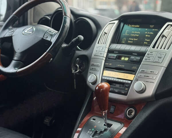 Черный Лексус РХ, объемом двигателя 3.46 л и пробегом 195 тыс. км за 11950 $, фото 120 на Automoto.ua