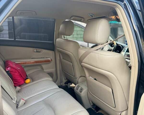 Черный Лексус РХ, объемом двигателя 3.3 л и пробегом 263 тыс. км за 13900 $, фото 4 на Automoto.ua