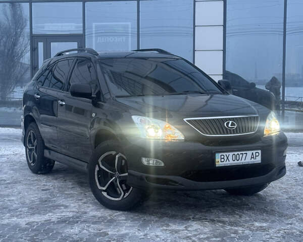 Черный Лексус РХ, объемом двигателя 3.46 л и пробегом 195 тыс. км за 11950 $, фото 39 на Automoto.ua