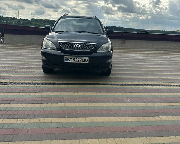 Чорний Лексус РХ, об'ємом двигуна 3.51 л та пробігом 225 тис. км за 12000 $, фото 6 на Automoto.ua