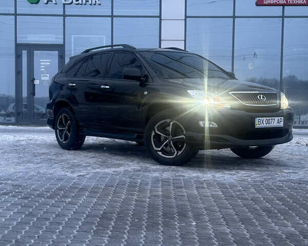 Черный Лексус РХ, объемом двигателя 3.46 л и пробегом 195 тыс. км за 11950 $, фото 45 на Automoto.ua