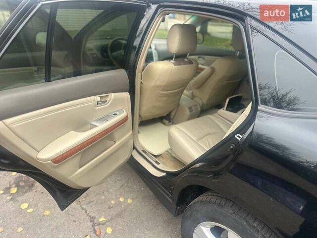 Черный Лексус РХ, объемом двигателя 3.46 л и пробегом 220 тыс. км за 12800 $, фото 2 на Automoto.ua