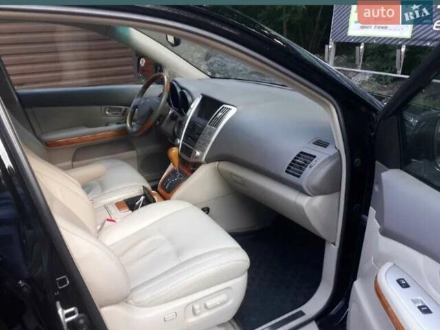 Черный Лексус РХ, объемом двигателя 3.5 л и пробегом 300 тыс. км за 16300 $, фото 1 на Automoto.ua