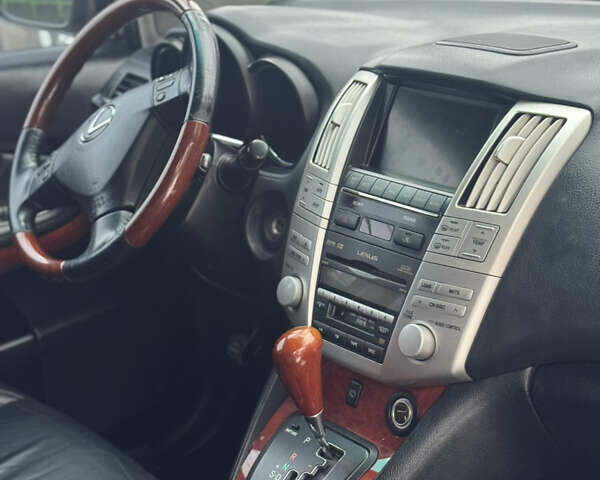 Черный Лексус РХ, объемом двигателя 3.46 л и пробегом 195 тыс. км за 11950 $, фото 103 на Automoto.ua