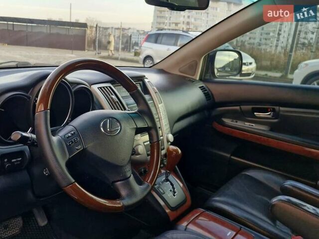 Черный Лексус РХ, объемом двигателя 3.46 л и пробегом 256 тыс. км за 11350 $, фото 32 на Automoto.ua