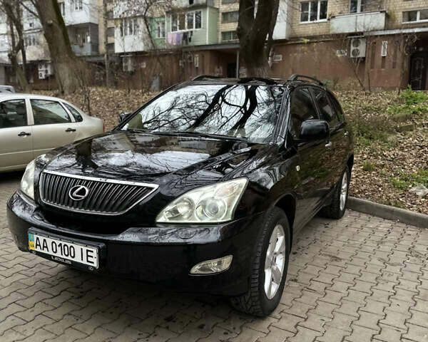 Черный Лексус РХ, объемом двигателя 3.5 л и пробегом 255 тыс. км за 12000 $, фото 1 на Automoto.ua