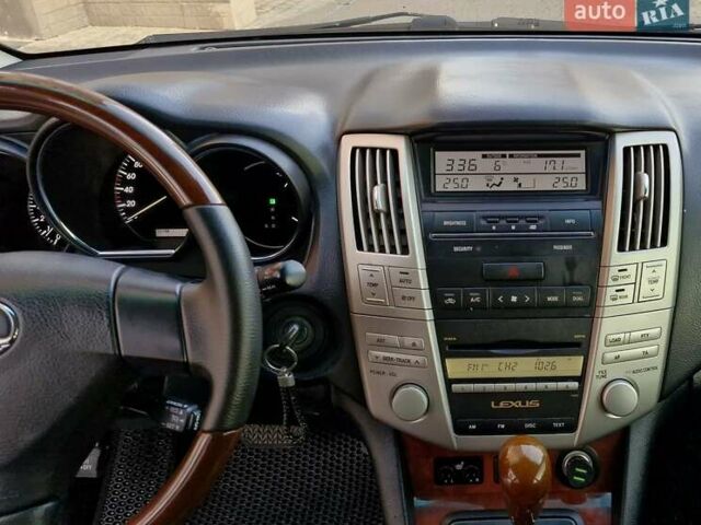 Черный Лексус РХ, объемом двигателя 3.46 л и пробегом 256 тыс. км за 11350 $, фото 46 на Automoto.ua