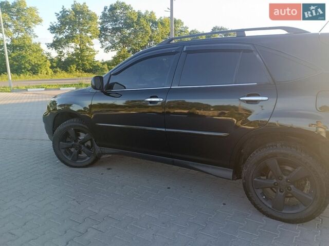 Чорний Лексус РХ, об'ємом двигуна 3.46 л та пробігом 264 тис. км за 11900 $, фото 7 на Automoto.ua