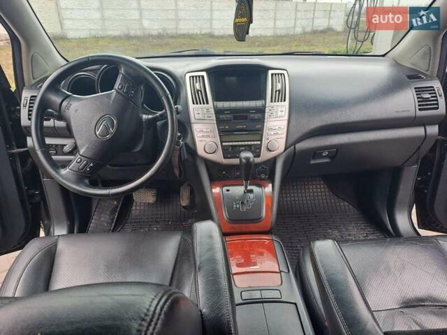 Черный Лексус РХ, объемом двигателя 3.46 л и пробегом 270 тыс. км за 9700 $, фото 7 на Automoto.ua