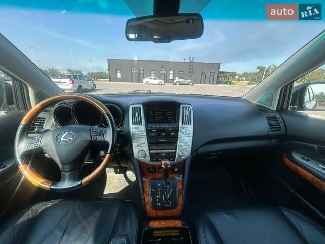 Черный Лексус РХ, объемом двигателя 3.46 л и пробегом 230 тыс. км за 14100 $, фото 61 на Automoto.ua