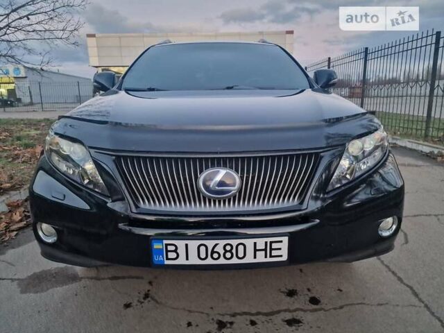 Черный Лексус РХ, объемом двигателя 3.5 л и пробегом 210 тыс. км за 18350 $, фото 1 на Automoto.ua