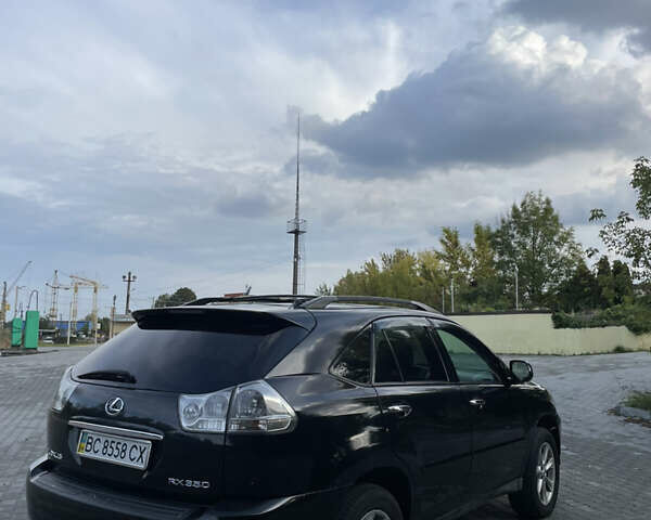 Черный Лексус РХ, объемом двигателя 3.46 л и пробегом 260 тыс. км за 11500 $, фото 1 на Automoto.ua